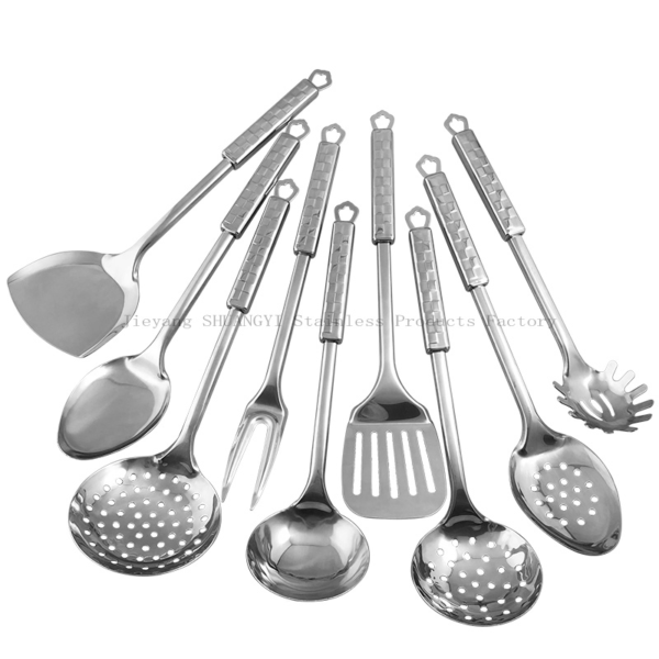 Set of stainless steel handle kitchen tools or utensils arranged in a fan viewed against white background