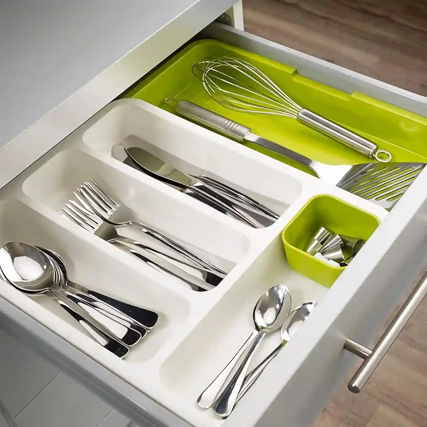 Silver utensils in drawer expandable tray