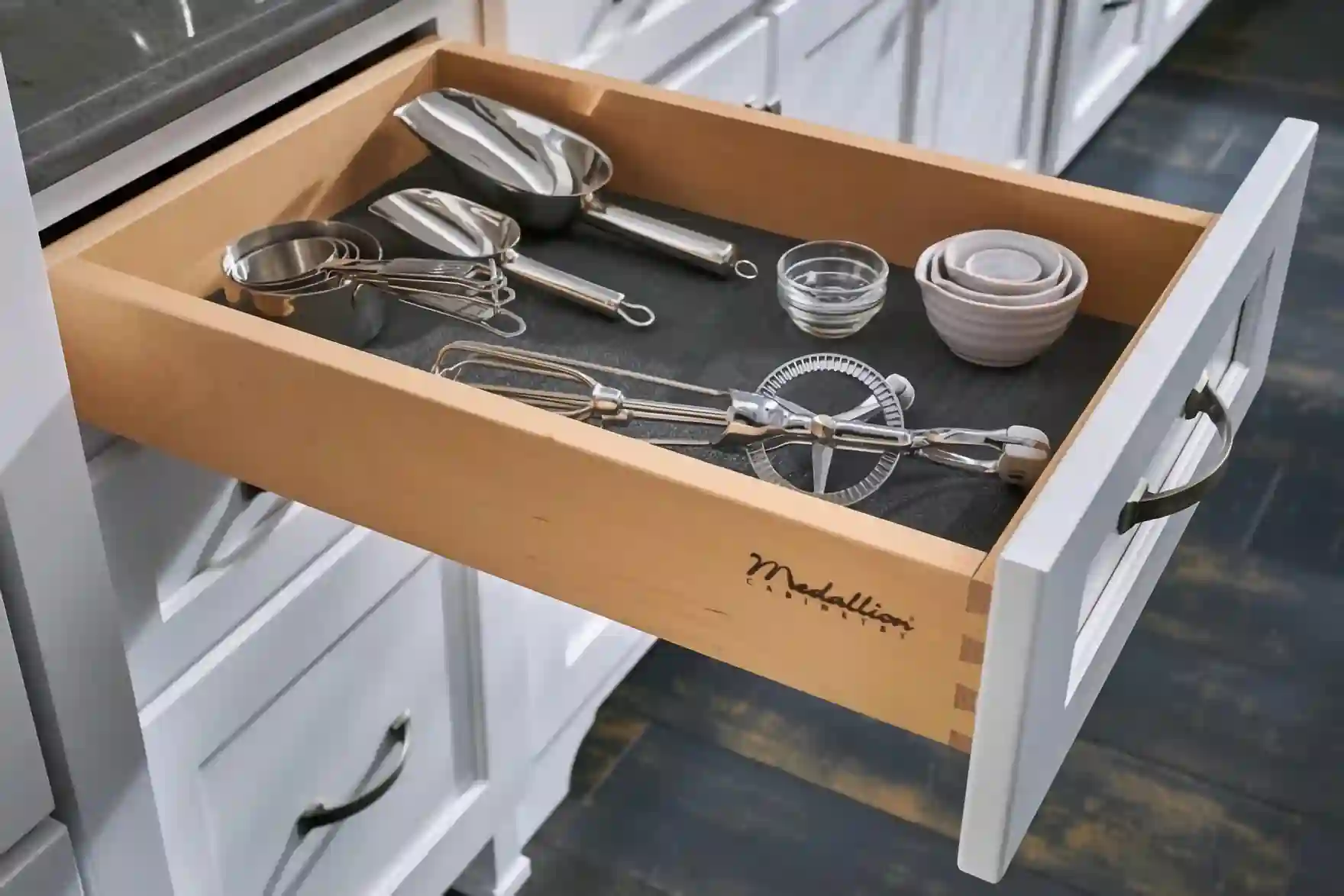 Utensil in kitchen drawer with liner