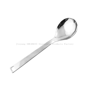 stainless steel rice spoon against white background