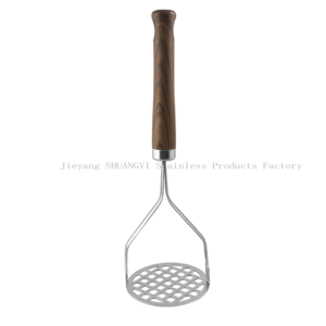 Stainless steel metal potato masher against white background