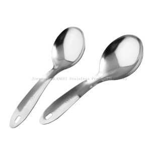 stainless steel rice serving spoon against white background